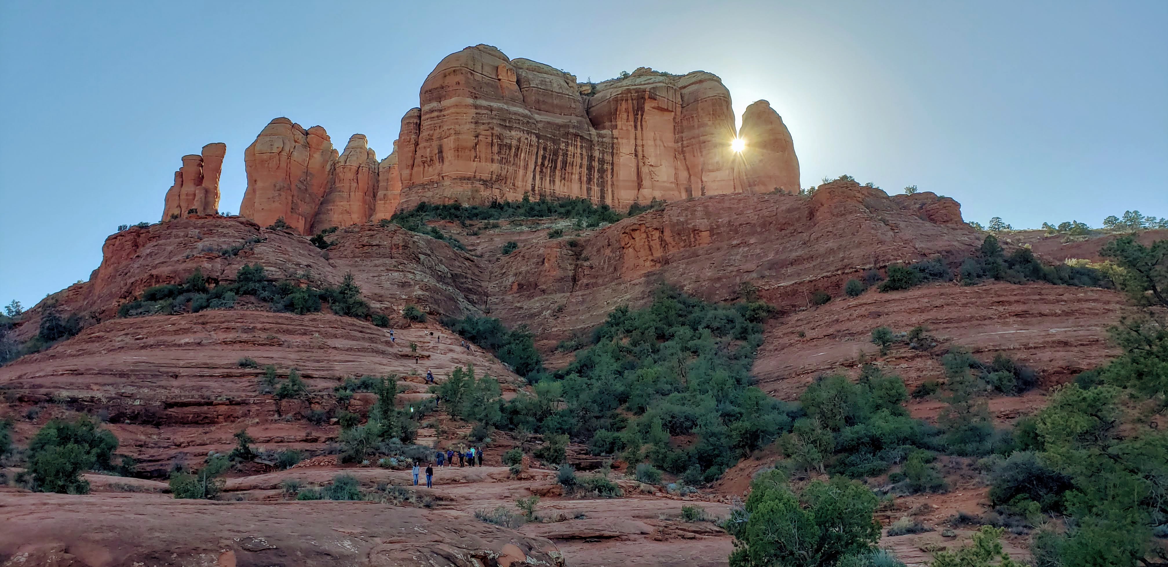 Sunrise coming through a rock structure symbolizing hope when implementing Dialectical Behavior Therapy (DBT)